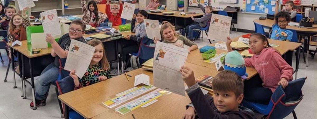 Students show off their drawings