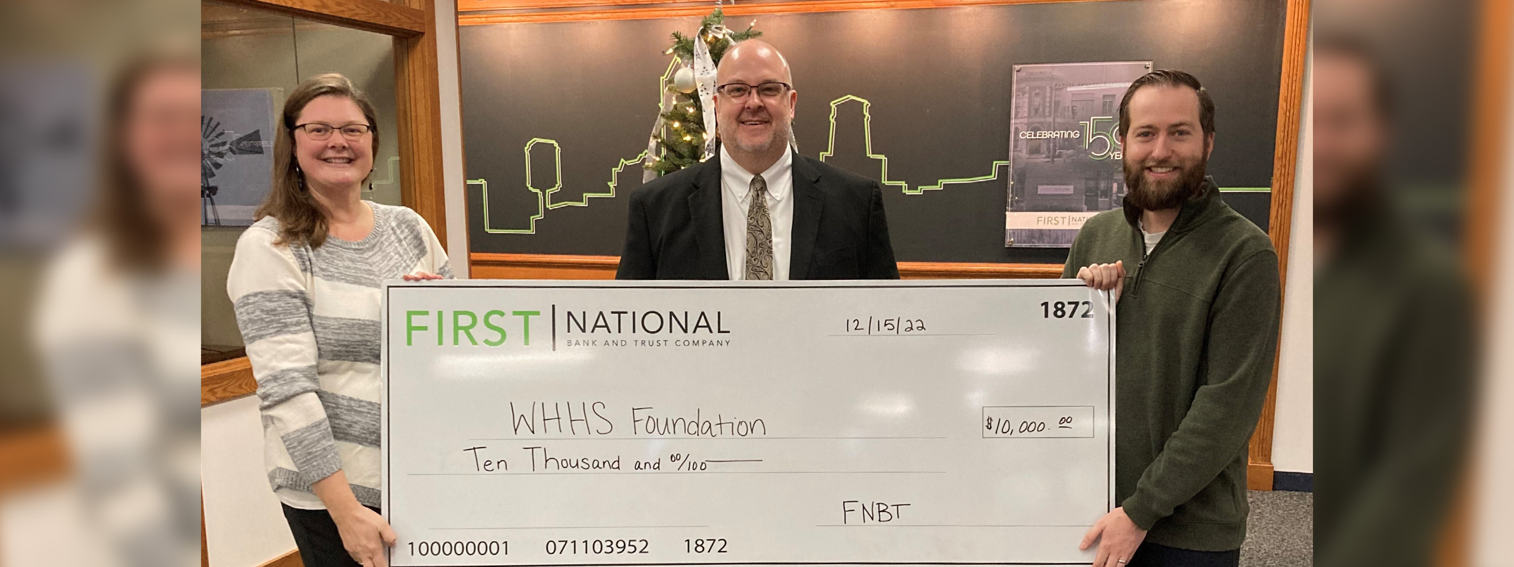 WHHS Foundation receiving check from FNBT employees