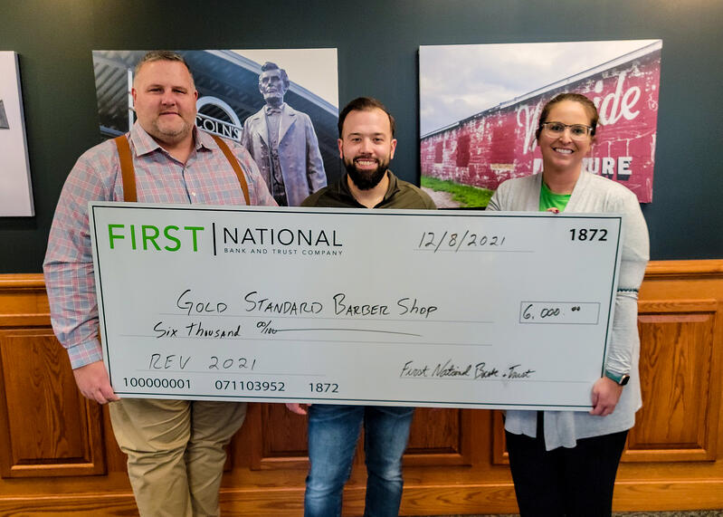 gold standard barber shop receiving REV check